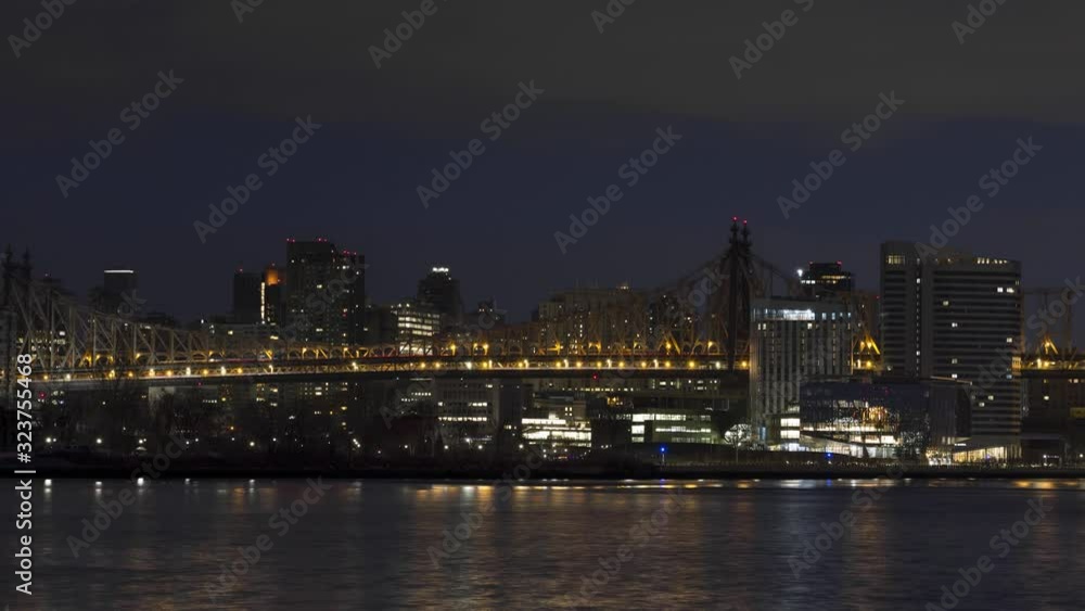Queensboro Bridge and Roosevelt island from East river night to Day Timelapse Queensboro Bridge and Roosevelt island from East river night to Day Timelapse