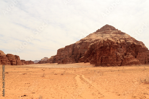 Wadi Rum desert panorama with dunes  mountains and sand  Jordan