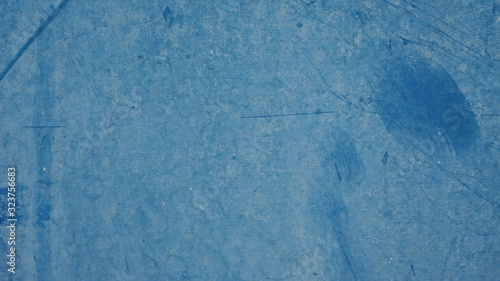 The surface of the metal blue cabinet .