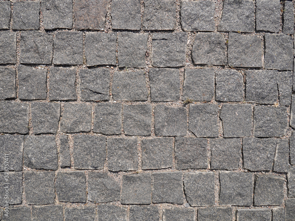 Old paving stones closeup, background, texture. Old paving stones closeup, background, texture.
