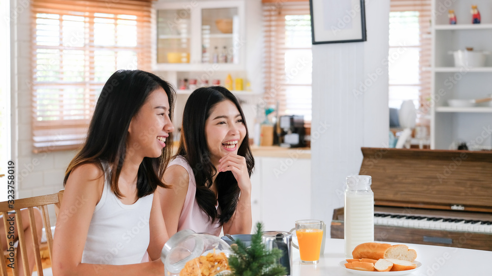Happy asian lesbian woman couple have breakfast at house in morning with love and tender.LGBTQ lifestyle concept Happy asian lesbian woman couple have breakfast at house in morning with love and tender.LGBTQ lifestyle concept