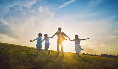 Happy family on summer walk