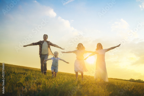 Happy family on summer walk
