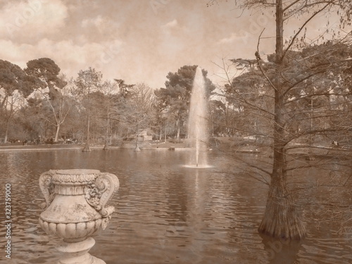 Old photograph of Retiro Park, Madrid, Spain, aged by the patina of time,