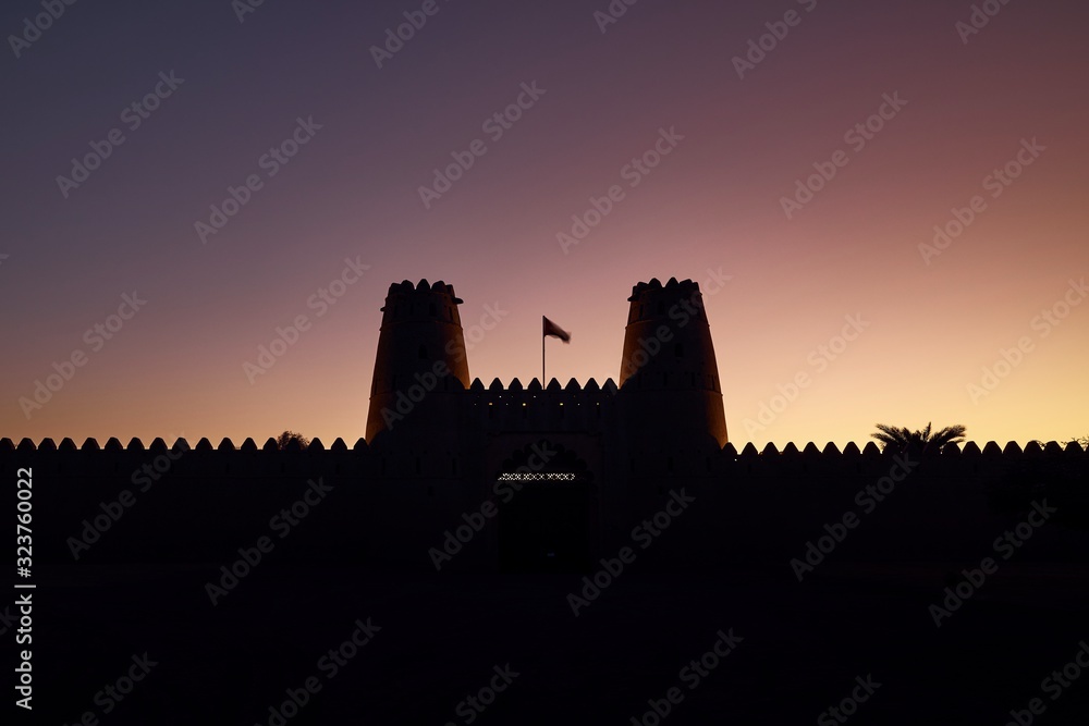 Silhouette of historical fort at dawn