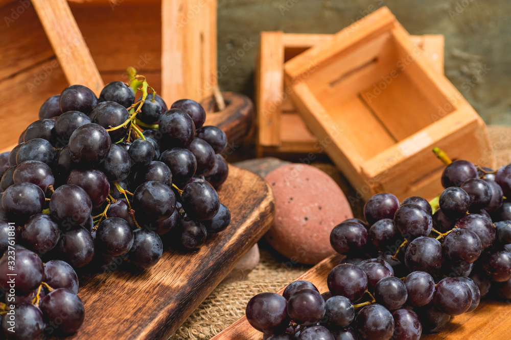 freshly cut fresh grapes in a rustic setting freshly cut fresh grapes in a rustic setting