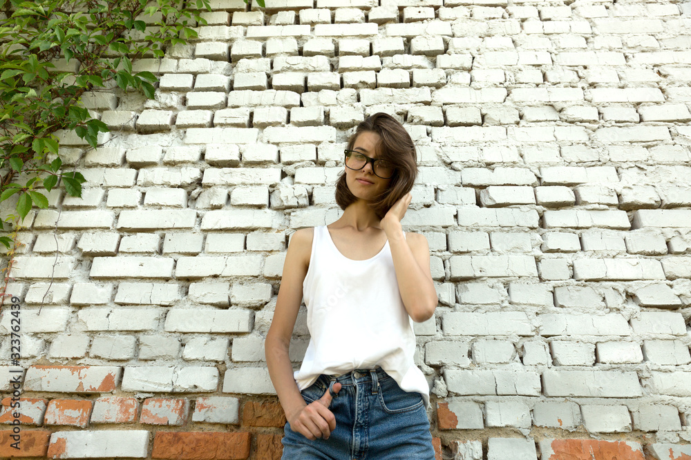 Portrait of a young student with glasses. Portrait of a young student with glasses.
