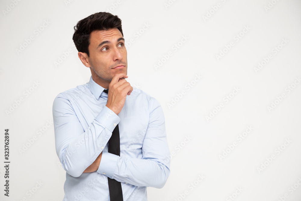 Portrait of Young businessman thinking and looking aside isolated on white background Portrait of Young businessman thinking and looking aside isolated on white background