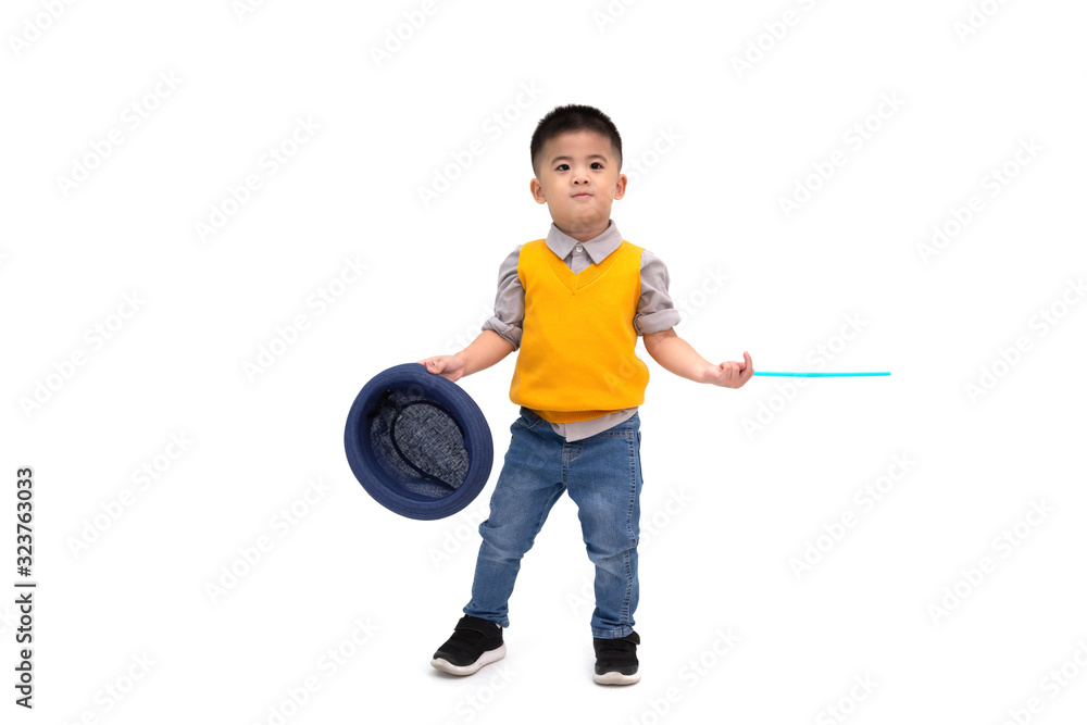 Asian cute little magician holding hat isolated on white background Asian cute little magician holding hat isolated on white background