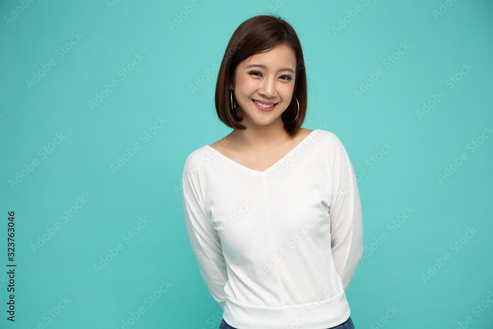Portrait of young woman smiling and looking at camera isolated over white background, Happy feeling concept Portrait of young woman smiling and looking at camera isolated over white background, Happy feeling concept