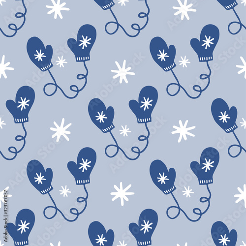 Winter mittens and snowflakes seamless repeat pattern.Hand drawn gloves pattern.