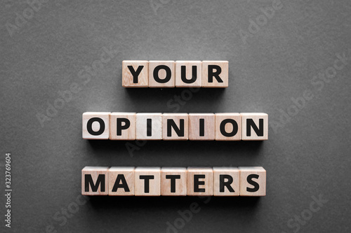 Your opinion matters - words from wooden blocks with letters, Your feedback is important concept, top view gray background