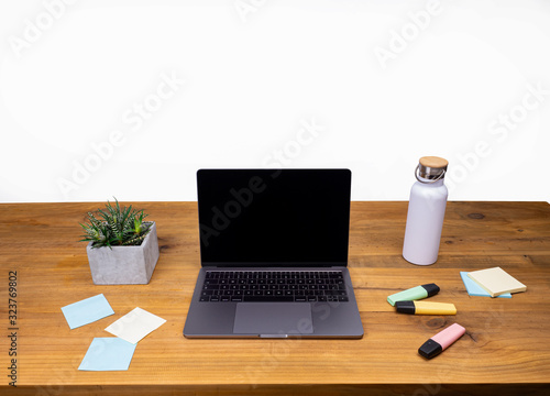 Table shot desk view with pencil a plant, workspace, business, laptop and notes