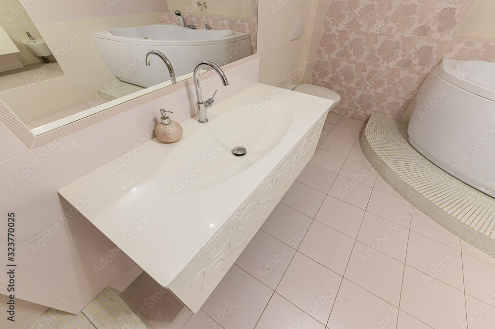 Russia, Moscow- October 17, 2019: interior room apartment modern bright cozy atmosphere. general cleaning, home decoration, bathroom, sink, decoration elements, toilet Russia, Moscow- October 17, 2019: interior room apartment modern bright cozy atmosphere. general cleaning, home decoration, bathroom, sink, decoration elements, toilet
