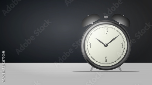 Realistic desk clock. Black retro alarm clock stands on the table. Retro watch. Vector illustration