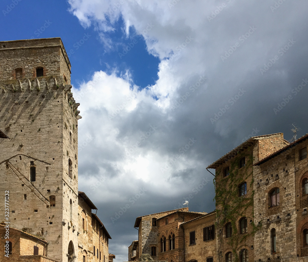 Beautiful Piazza della Cisterna in San Gimignano, Tuscany, Italy Beautiful Piazza della Cisterna in San Gimignano, Tuscany, Italy
