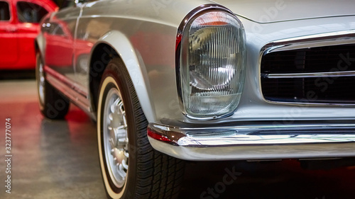 Detail of classic car. Close-up of headlight.