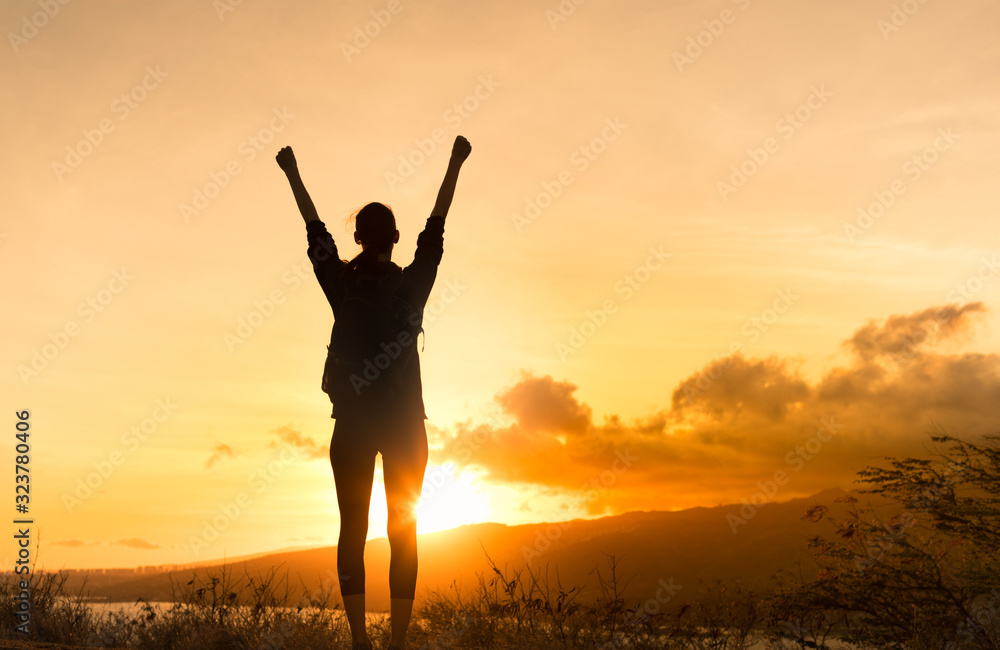 Woman with fist up tot he sky feeling strong and powerful. Woman with fist up tot he sky feeling strong and powerful.