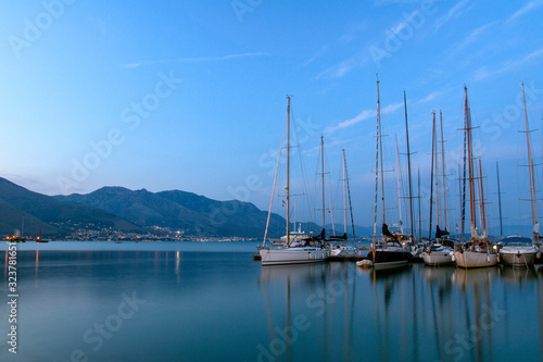 View of sailing yachts in the Mediterranean in beautiful evening light  a summer cruise. Gaeta  Italy.