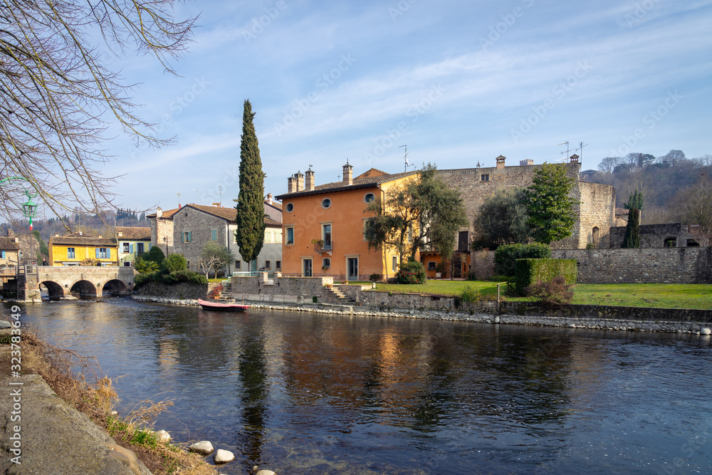 Fototapeta premium Borghetto sul Mincio, Verona, Italy. Glimpse of the medieval village of Vallegio. Considered one of the most beautiful villages in Italy, it dates back to the Lombard period