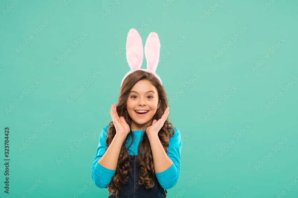 Beauty face of Easter. Happy child celebrate Easter. Beauty look of cute bunny. Hair and beauty salon. Fashion and style. Holiday celebration. Spring and renewal. Beauty is all about you, copy space Beauty face of Easter. Happy child celebrate Easter. Beauty look of cute bunny. Hair and beauty salon. Fashion and style. Holiday celebration. Spring and renewal. Beauty is all about you, copy space