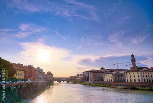 A view along the Arno River towards the Ponte Vecchio in Florence, Italy. © Jbyard