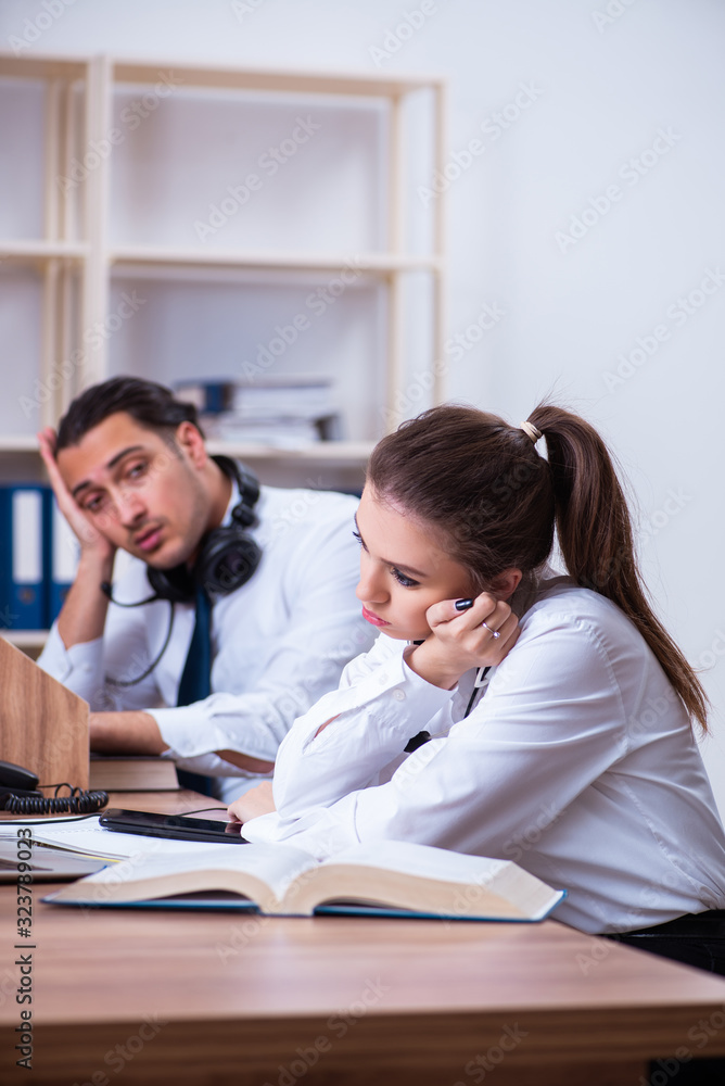 Call center operators working in the office Call center operators working in the office