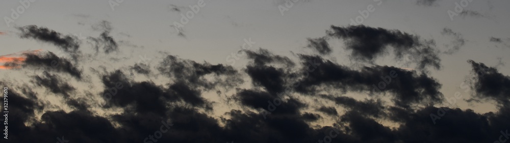 Fototapeta premium Winterly evening clouds over Berlin and Brandenburg of February 17, 2020, Germany