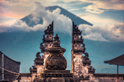 Bali traditional architecture background with temple Lempuyang with view on Agung volcano mount during sunset