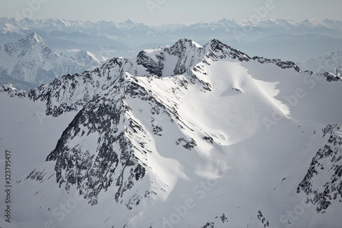 Austrian Mountains in the Alps of Tyrol. Alpine Winter landscape and mountain panorama in Europe. Glacier Stubaier Gletscher Skiing area near Innsbruck. Majestic scenery