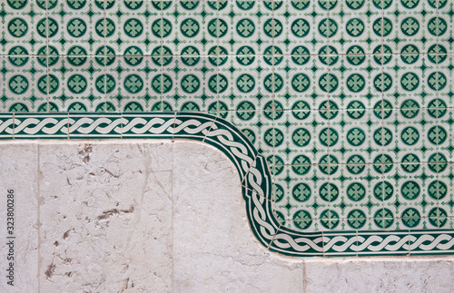 Detail of a building facade decorated with azulejo tiles