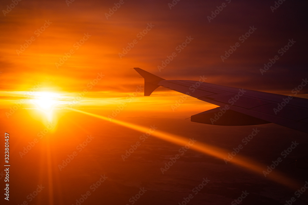 wing view plane in the sky sunrise wing view plane in the sky sunrise