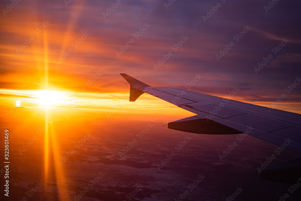 wing view plane in the sky sunrise wing view plane in the sky sunrise