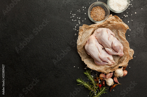 Raw partridge meat on kitchen, cooking gourmet wild bird. Healthy diet recipe.