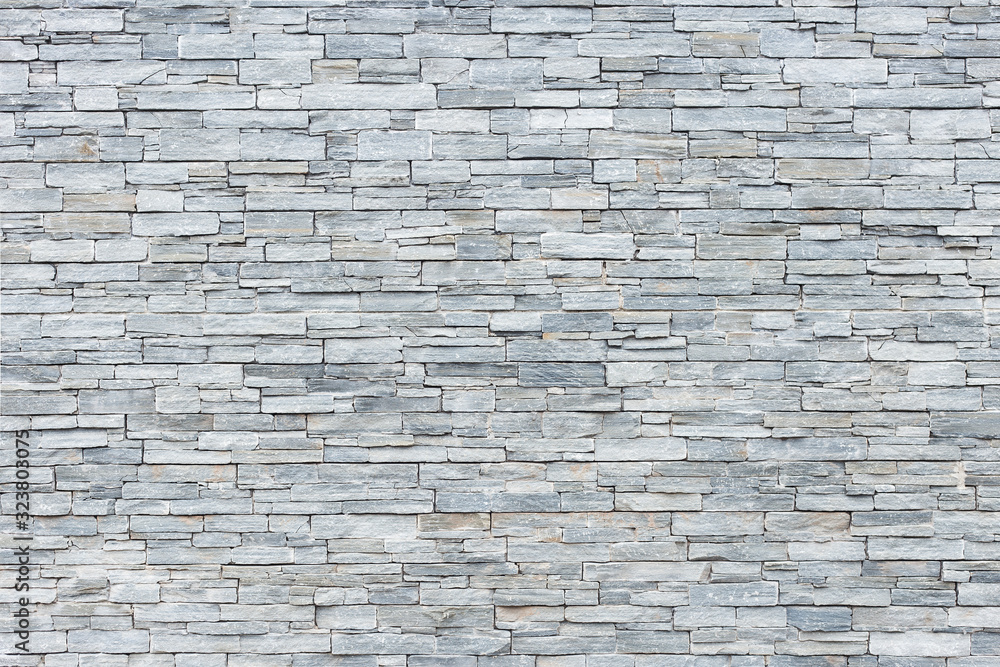 Obraz premium limestone wall in small rectangular blocks for background