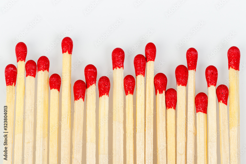 matches with a red head on a white background matches with a red head on a white background