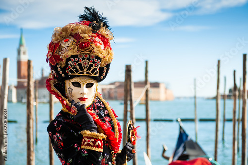 Beautiful colorful masks at traditional Venice Carnival in February 2020 in Venice, Italy © smallredgirl