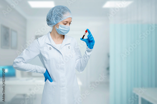 Coronavirus outbreaking. Doctor analyses blood sample in laboratory, Wuhan, China. MERS 2019-nCoV. photo