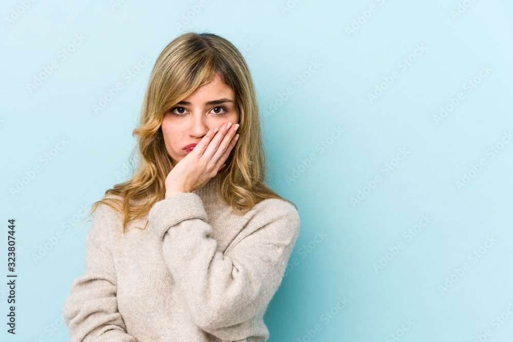 Young blonde caucasian woman who feels sad and pensive, looking at copy space. Young blonde caucasian woman who feels sad and pensive, looking at copy space.