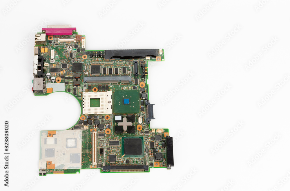 Laptop mother board with empty socket for CPU a integrated graphics card on white background Laptop mother board with empty socket for CPU a integrated graphics card on white background