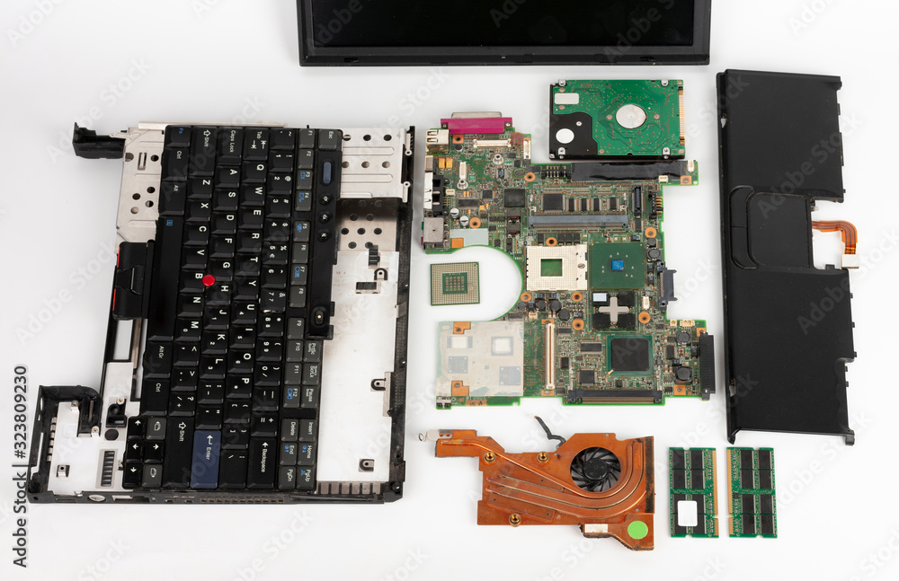 Disassembled laptop, basic components of notebook, screen, keyboard,  processor, motherboard, internal hard disk drive, CPU fan. Stock Photo |  Adobe Stock