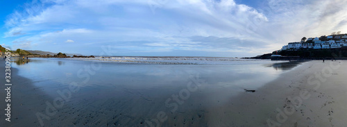 Tableau sur toile View looking out to sea from East Looe Beach during a brief quiet spell the Febr