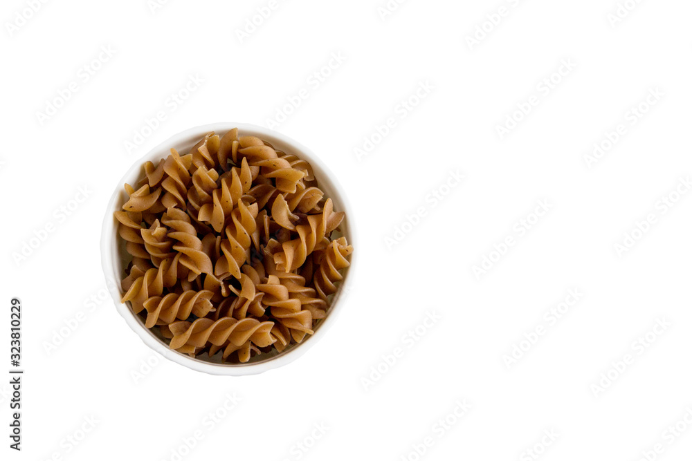 Buckwheat fusilli paste isolated on a white background. Buckwheat fusilli paste isolated on a white background.