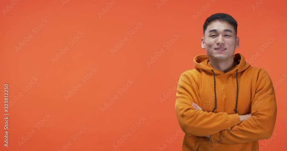 Young man pointing with finger Young man pointing with finger