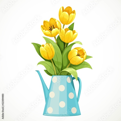 Bouquet of yellow tulips in a tall blue polka-dot jug with a thin nose isolated on white background