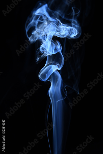 white and blue smoke on black background with abstract texture