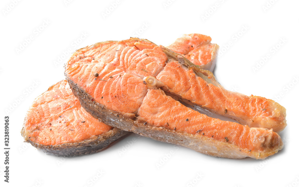 Fried salmon steaks on white background Fried salmon steaks on white background