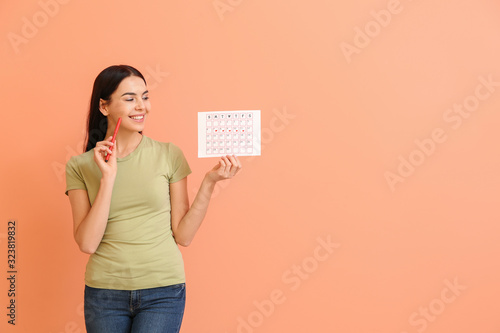 Young woman with menstrual ...