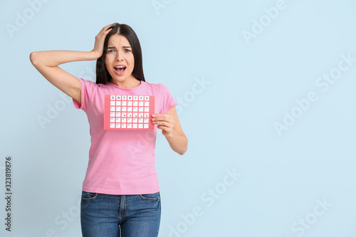 Stressed woman with menstru...