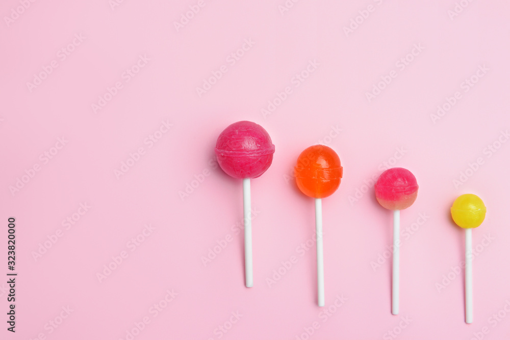 Tasty lollipops on color background Tasty lollipops on color background